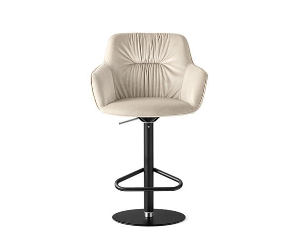 Cocoon: Two-tone armchair with plush seat and wooden legs