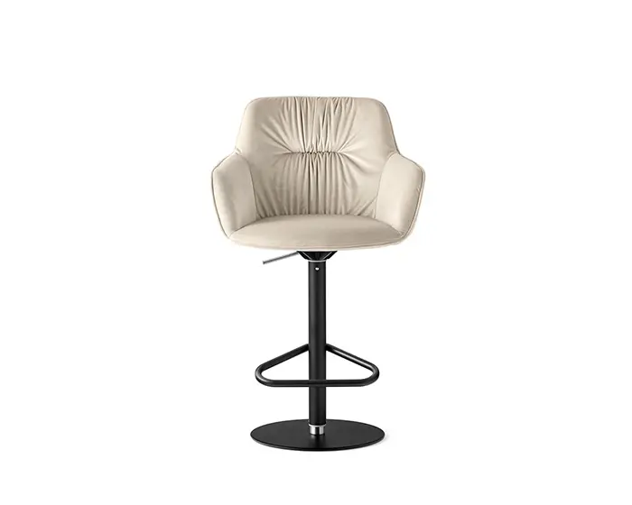 Cocoon: Two-tone armchair with plush seat and wooden legs