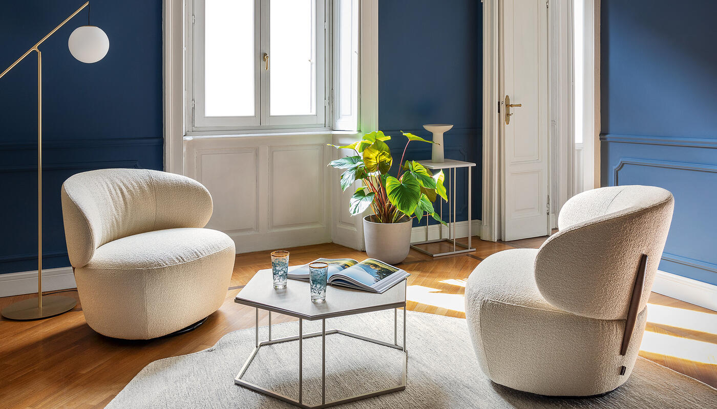 Mara: Plush upholstered armchair with swivel base | Calligaris New
